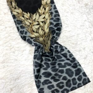 Premium leopard print fabric with gold leaf embroidery for fashion or decor