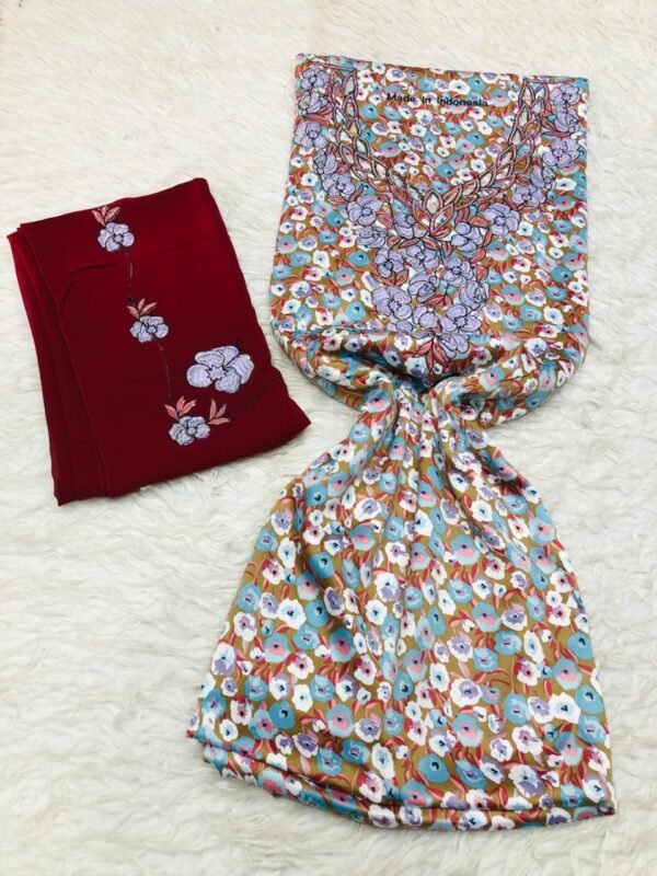 Red and brown embroidered Moroccan fabric set with curved floral motifs and tropical multicolor print