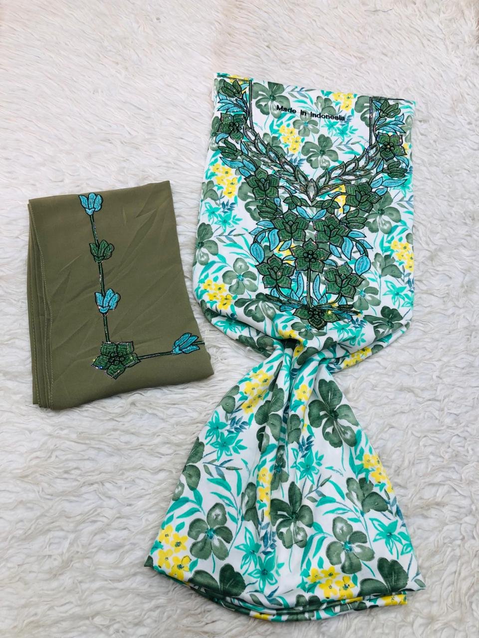 Olive & White Indonesian Embroidered Fabric Set – Coastal Bloom & Botanical Grace Olive green and white Indonesian embroidered fabric set with blue floral accents and tropical printed panel