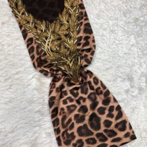 Beige fabric with intricate gold leaf embroidery and vine patterns for fashion or home décor